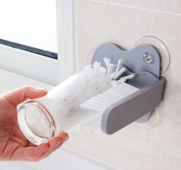Suction cup brush mounted on countertop